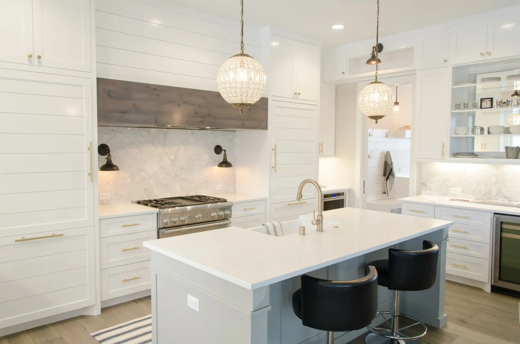 Bright kitchen cabinetry designed around the room